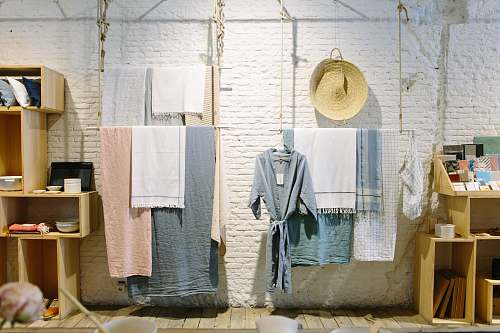 madrid assorted-color towels hanging inside room store